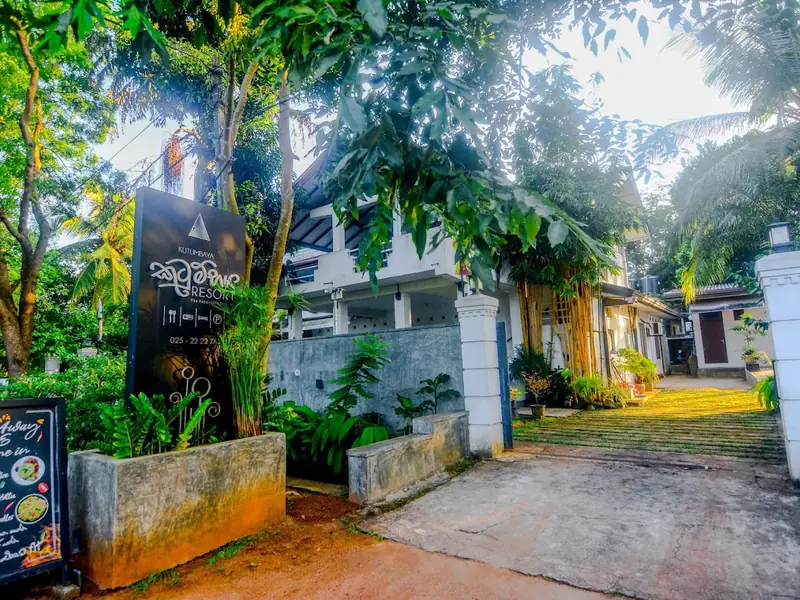 Kutumbaya Resort entrance surrounded by greenery in Anuradhapura
