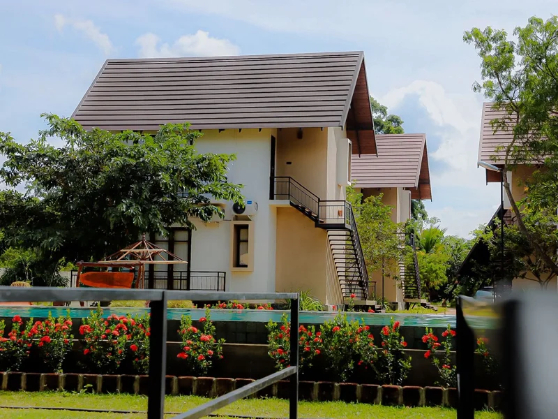 Modern resort-style hotel in Anuradhapura with pool and garden setting